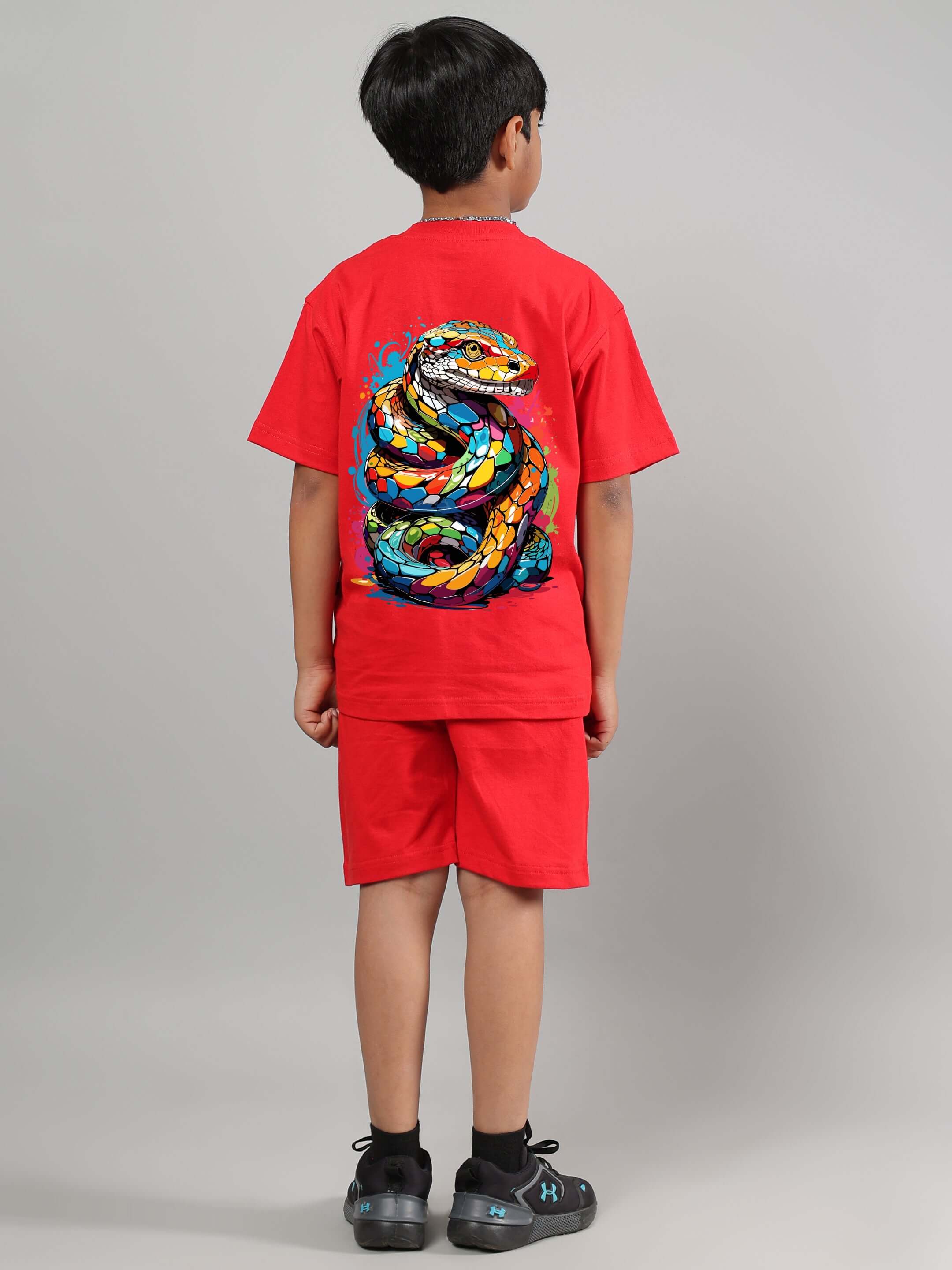 Red snake skin co-ord set for boys & girls, featuring vibrant snake print, custom fit option, designed by DUDS tailors.