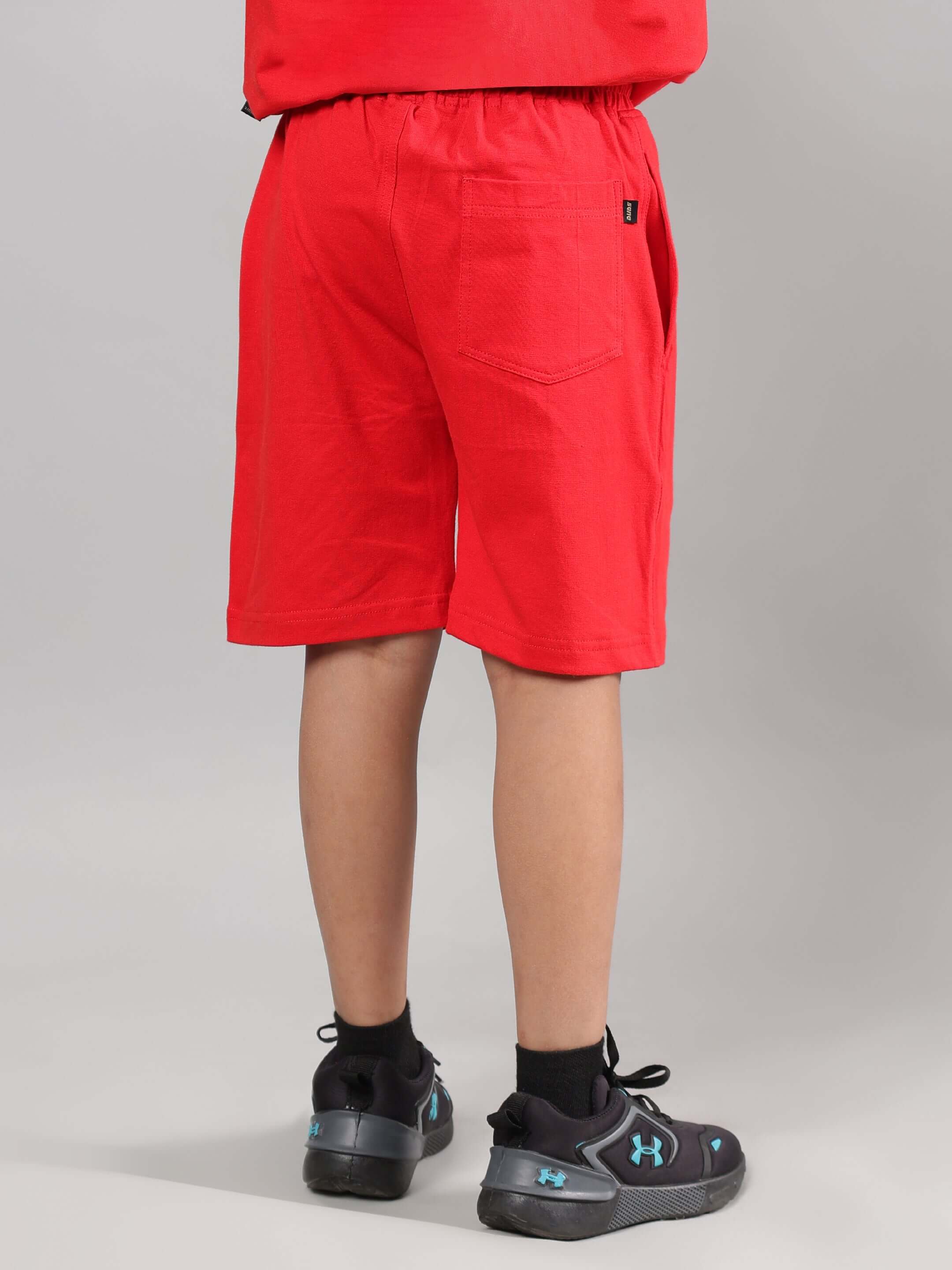 Back view of red Snake Skin shorts for boys and girls, perfect for kids' fashion, designed by DUDS.