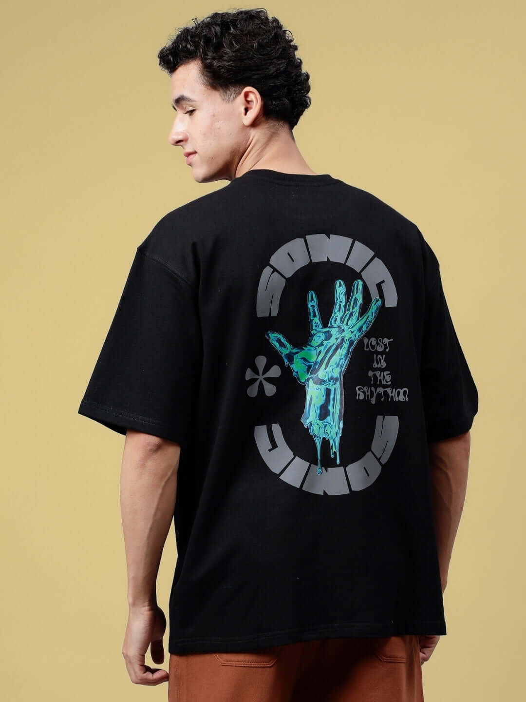Black oversized Sonic Sound Reflector T-shirt featuring a graphic print on the back, made from premium cotton French terry.