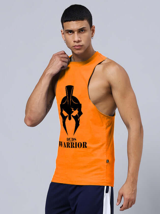 Person wearing orange Spartan Warrior printed gym t-shirt, showcasing muscle fit design.