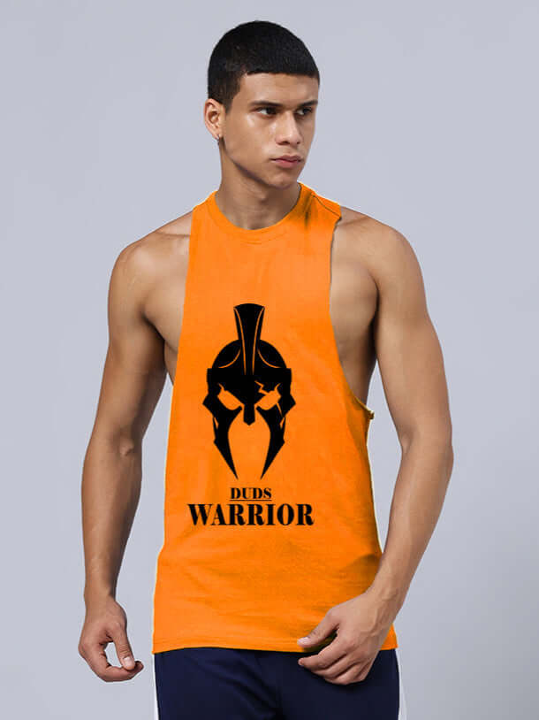 Man wearing SPARTAN WARRIOR printed orange gym t-shirt by DUDS, featuring a bold Spartan helmet design, perfect for fitness enthusiasts.