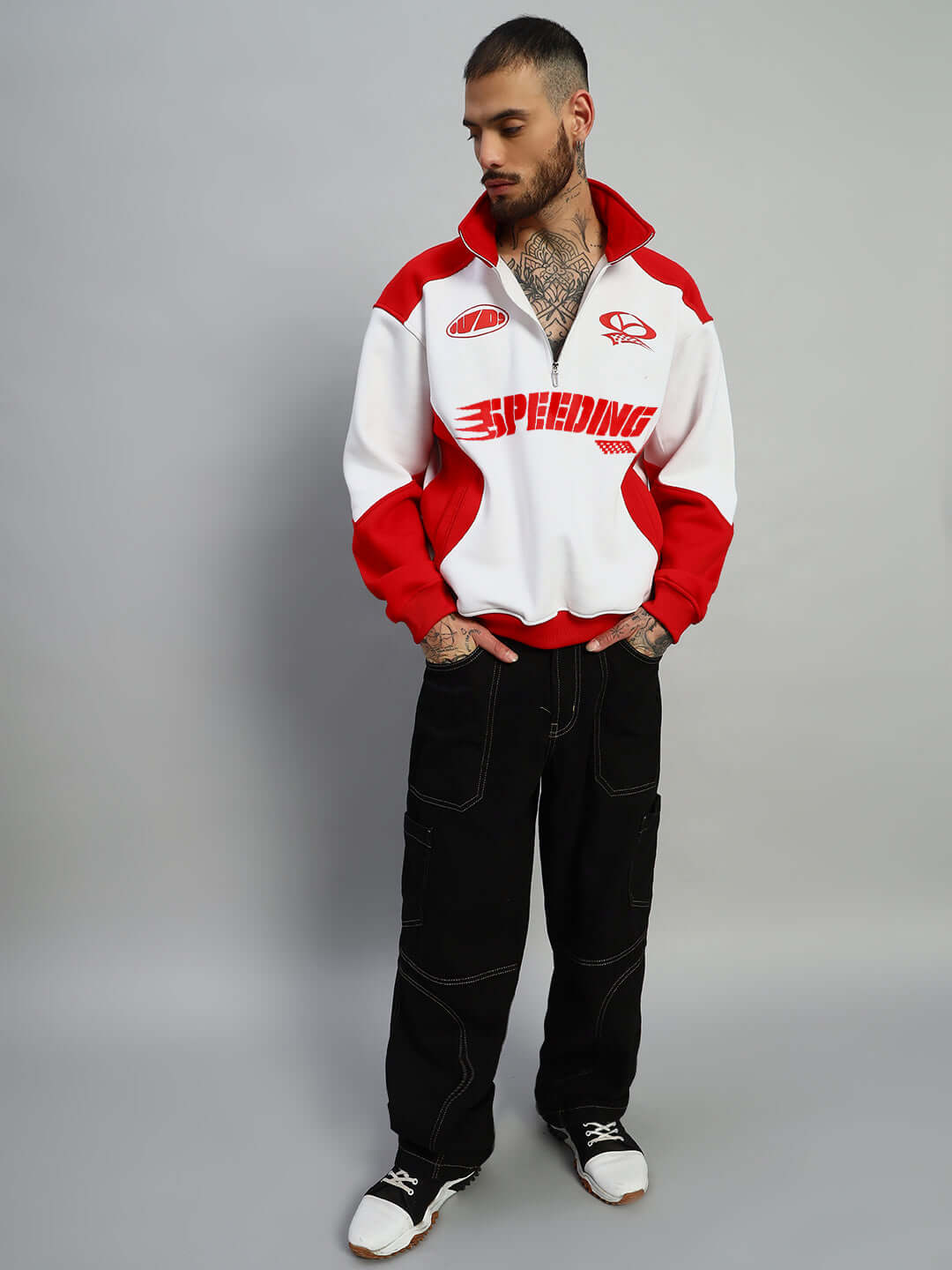 Man wearing a red SPEEDING colorblock jacket with customizable size options, made by DUDS tailors.