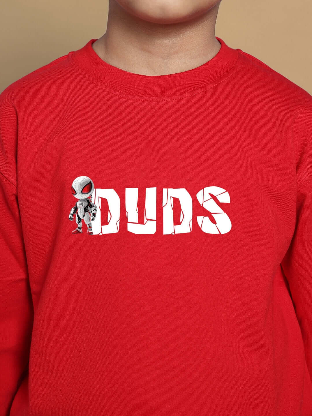 Child wearing red SPIDERROBO CO-ORD with DUDS logo for boys & girls, tailored by DUDS.