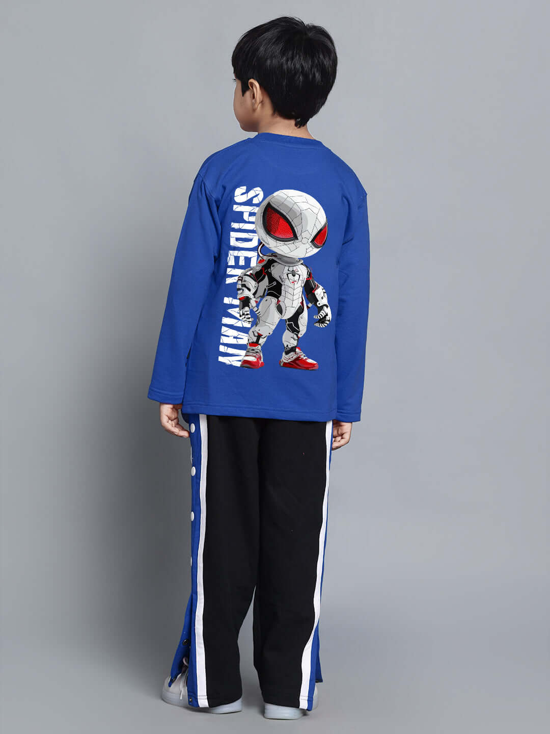 Child wearing SPIDERROBO COTTON CO-ORD FOR BOYS AND GIRLS BLUE BLACK with vivid design, ideal for fun and stylish outings.
