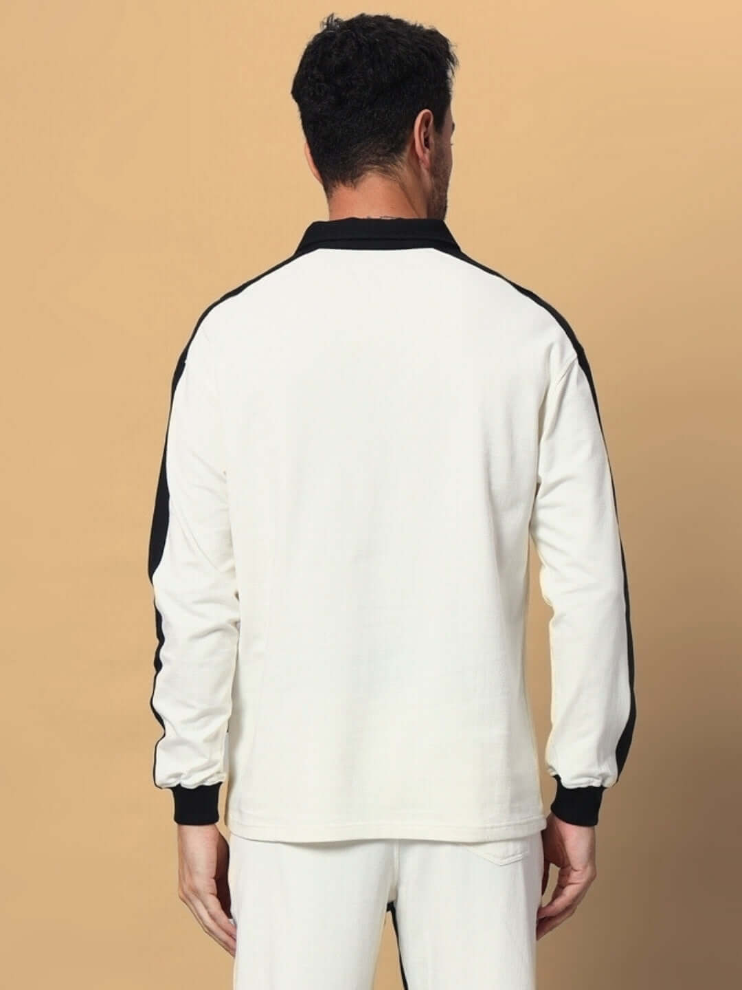 Back view of SPLINTER oversized sweatshirt in off white-black, featuring premium heavy gauge fabric and cotton terry, worn by male model.
