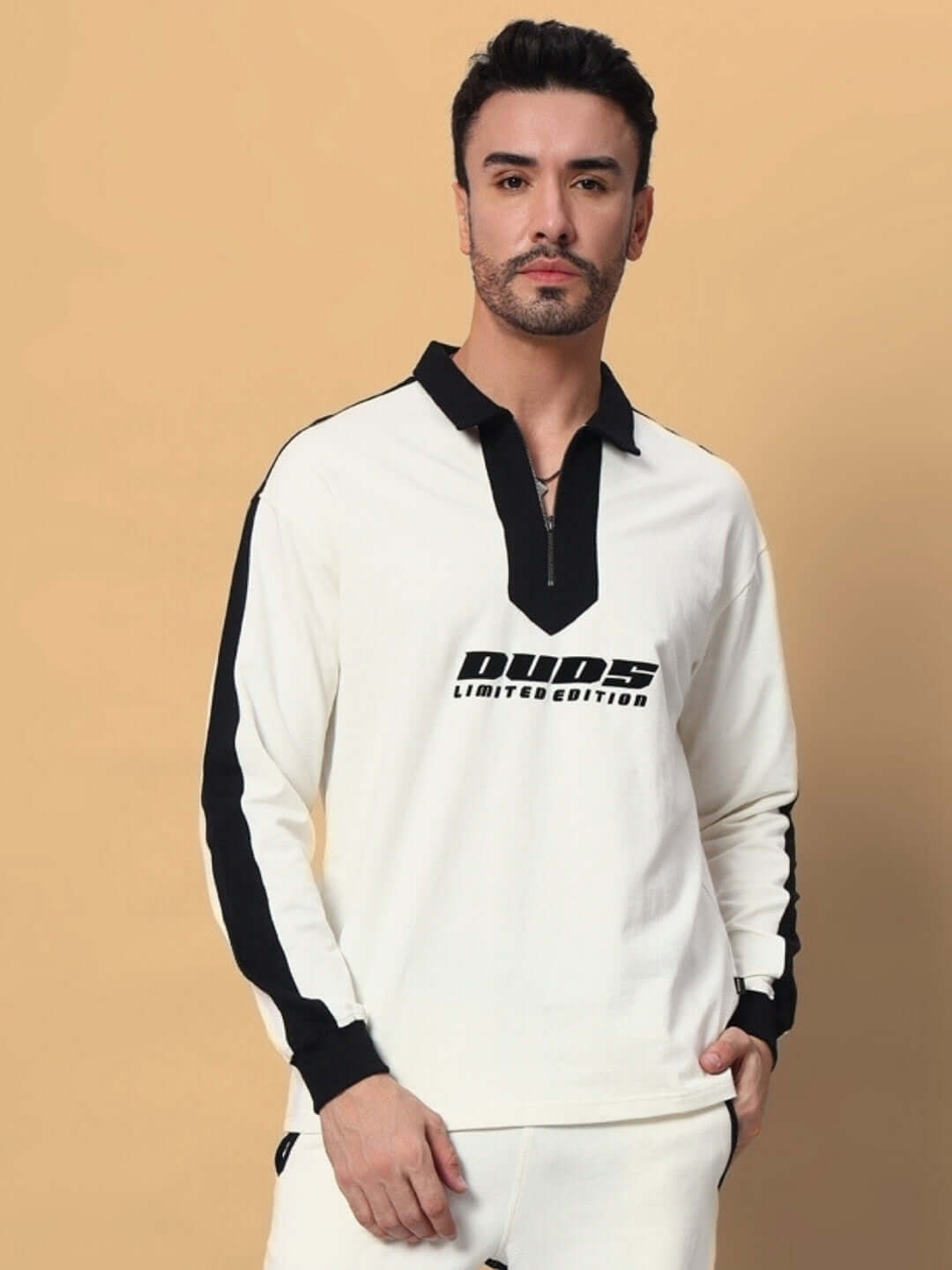 Model wearing Splinter Oversized Sweatshirt in off white-black, featuring premium cotton French terry fabric, showcasing limited edition design.