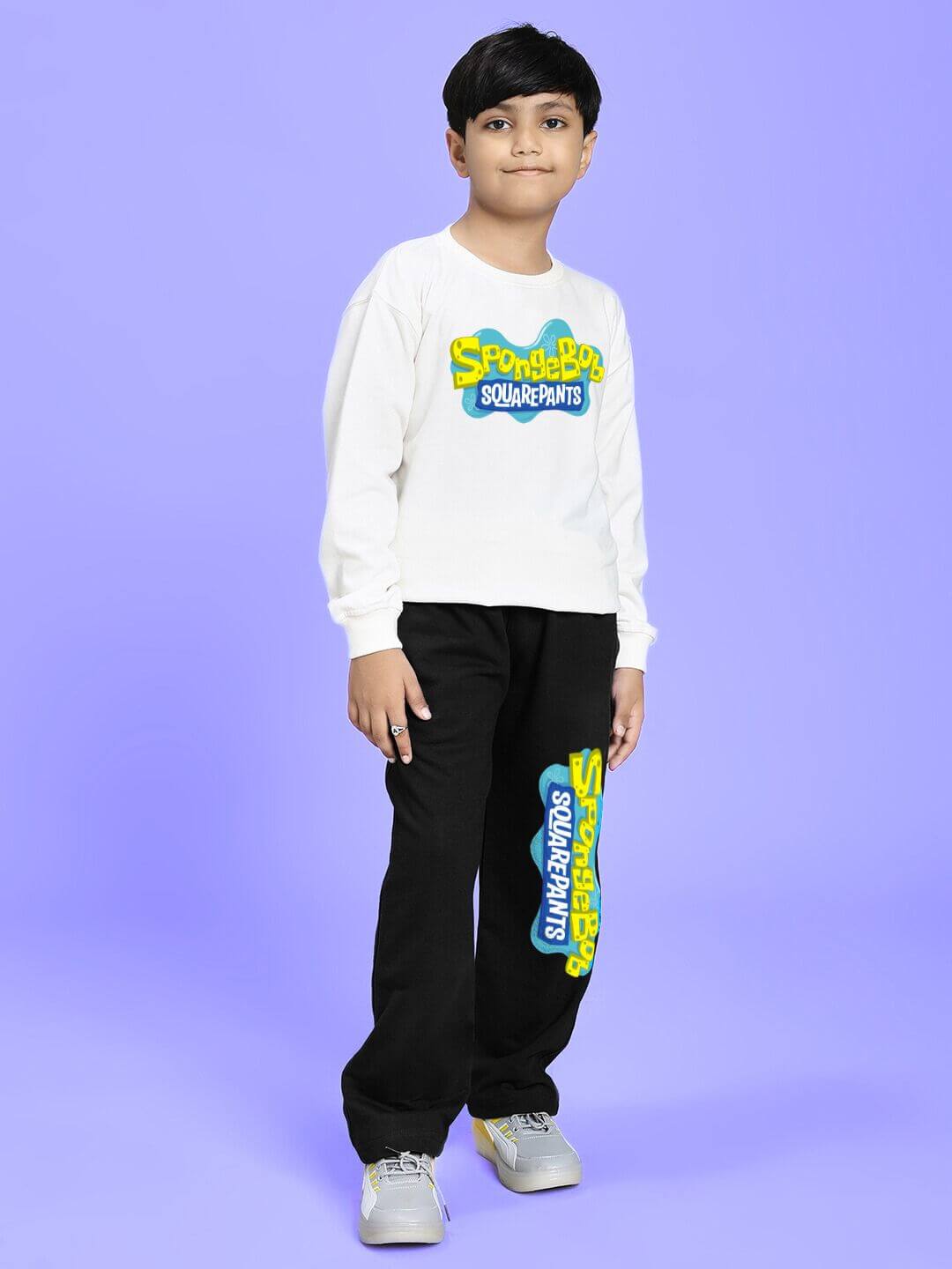 Child wearing SPONGEBOB SQUAREPANTS CO-ORD FOR BOYS AND GIRLS WHITE BLACK set with vibrant print on purple background.