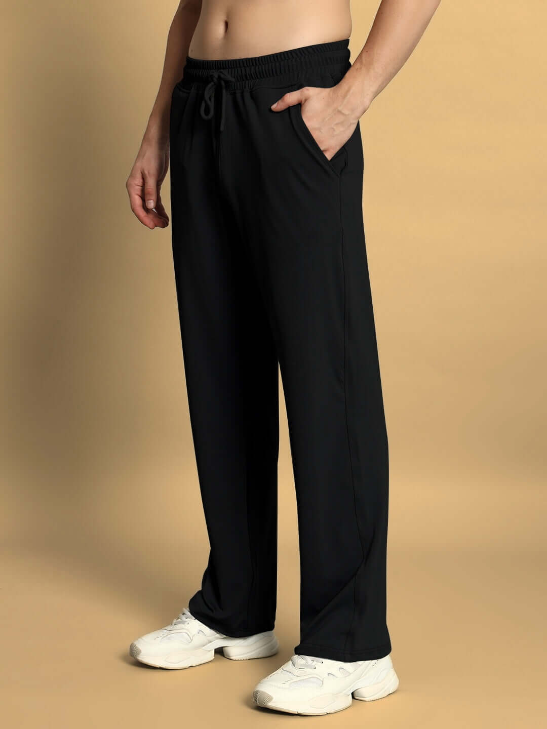 Model wearing black Springy Relaxed Fit Jogger with custom fit options by DUDS, showcasing comfort and style.