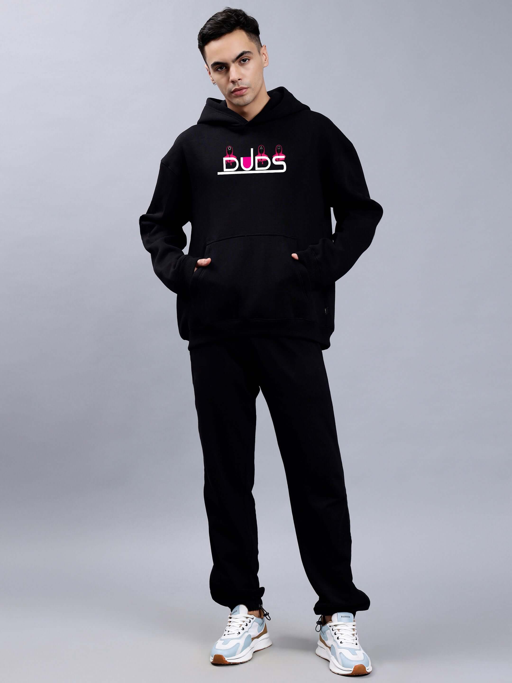Man wearing Squid Game Oversized Hoodie Men Black with streetwear style.