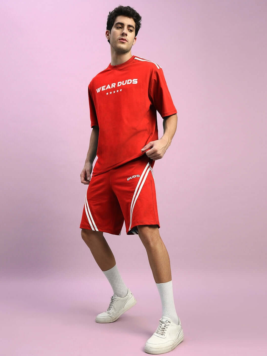 Man wearing STAR JUMPER SUMMER CO-ORD SET RED, featuring a relaxed fit, comfortable cotton-blend fabric, and bold streetwear style.