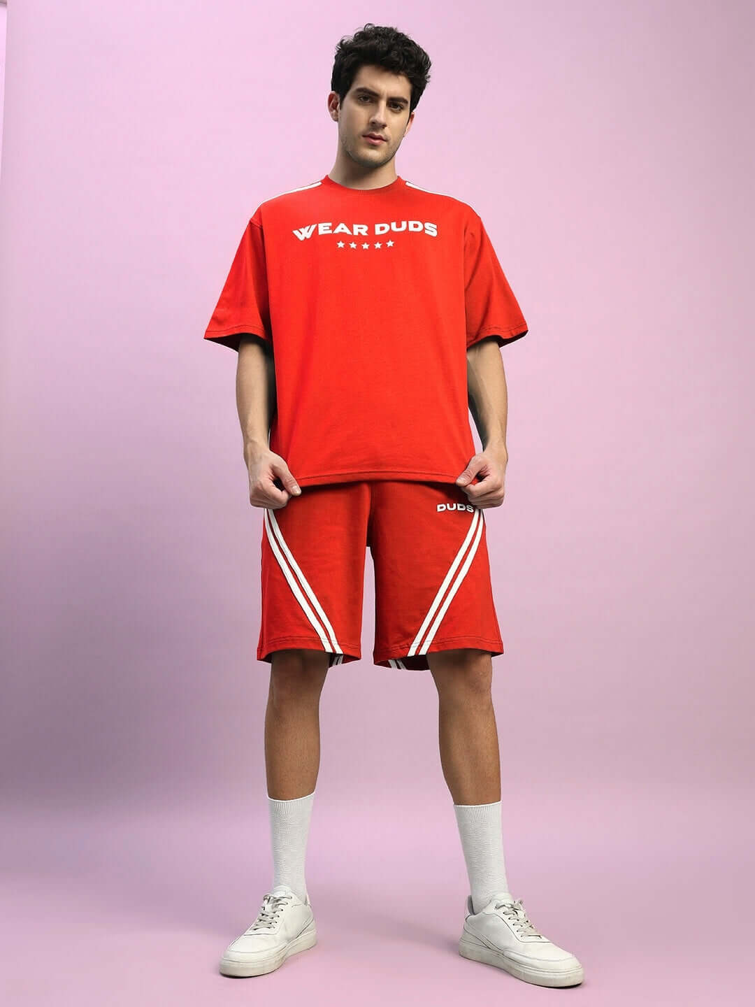 Red STAR JUMPER Summer Co-Ord Set for men, featuring premium cotton fabric and stylish design. Model stands against a pink backdrop.
