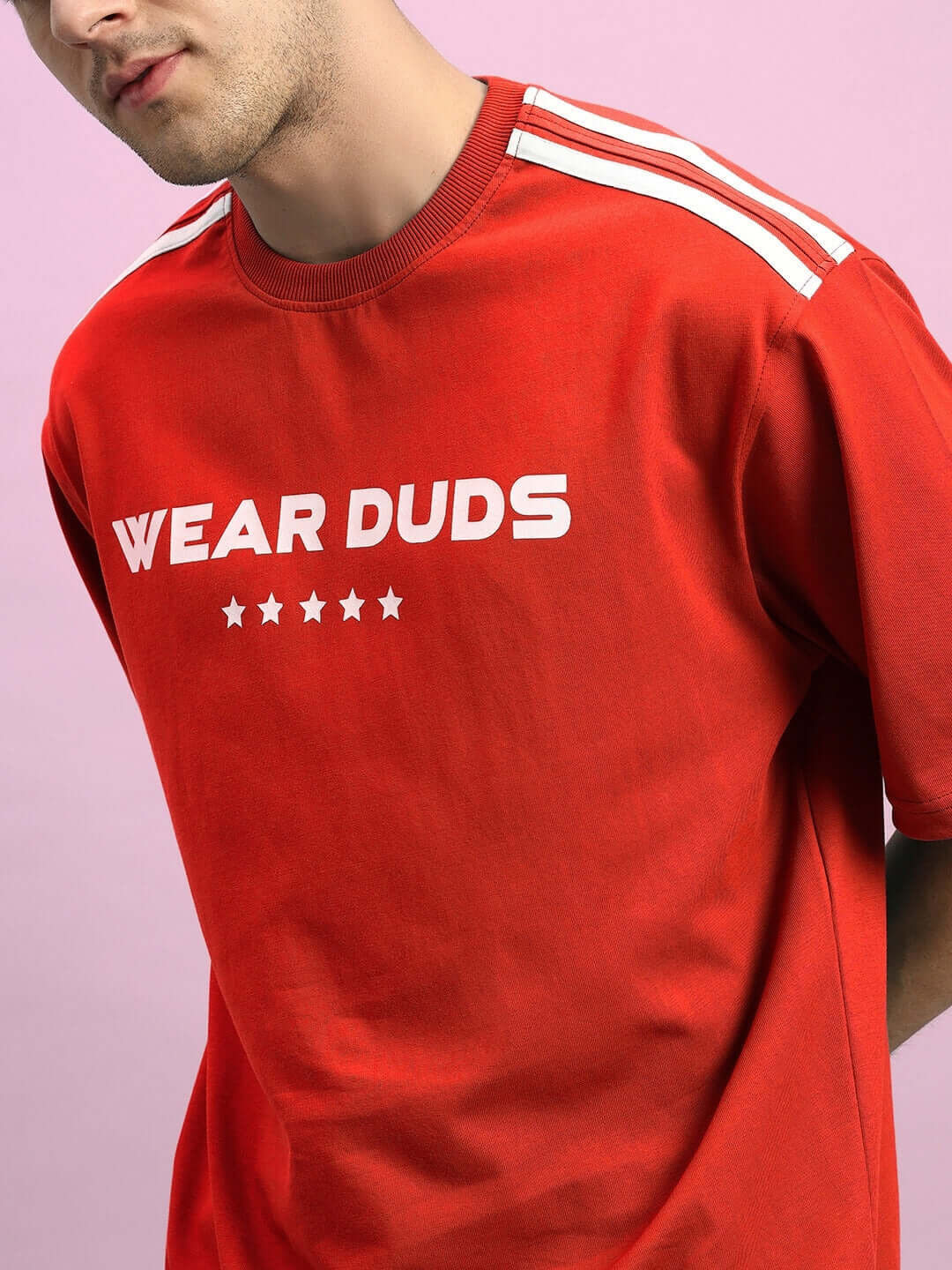 Red top from STAR JUMPER SUMMER CO-ORD SET RED with bold white text and stripe detail, casual streetwear for summer days.