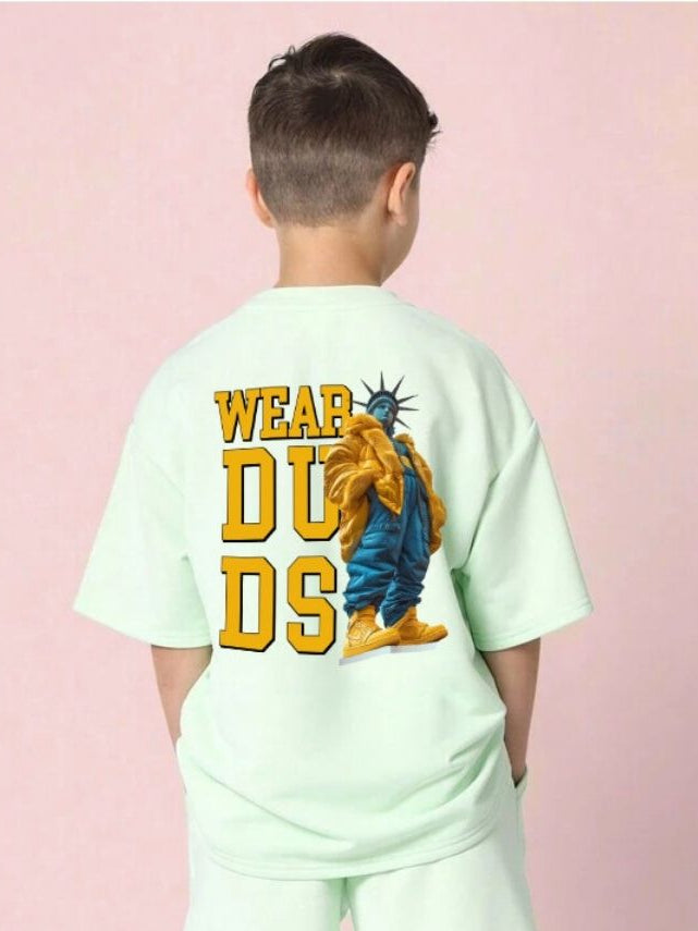 Boy wearing STATUE OF LIBERTY T-SHIRT FOR BOYS GIRLS MINT GREEN with artistic design on back, symbolizing freedom and individuality.