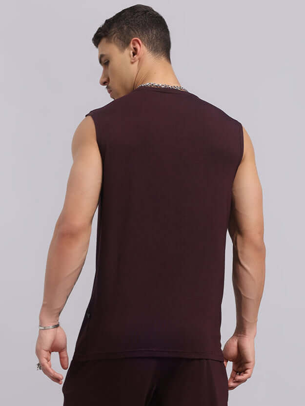 Back view of a wine-colored Strength Freak Fitness T-shirt, perfect for trendy and comfortable summer looks.