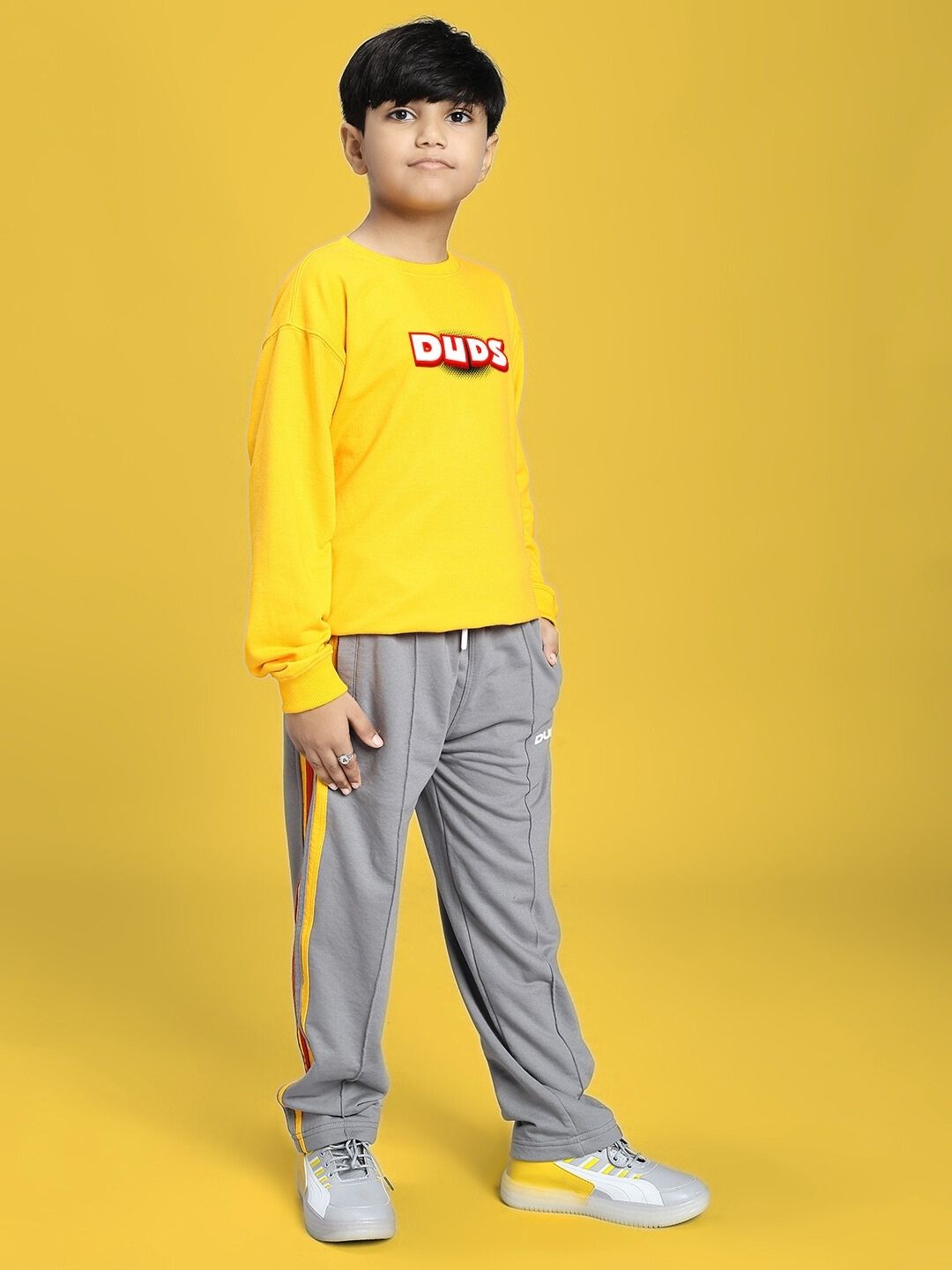 SUNSHINE STRIPE JOGGER FOR BOYS AND GIRLS RED GREY with yellow top, grey and yellow stripe pants.