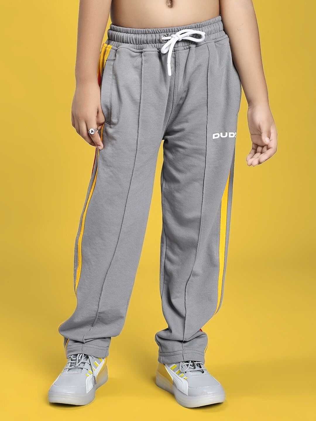 SUNSHINE STRIPE JOGGER FOR BOYS AND GIRLS RED GREY with yellow stripe detail.