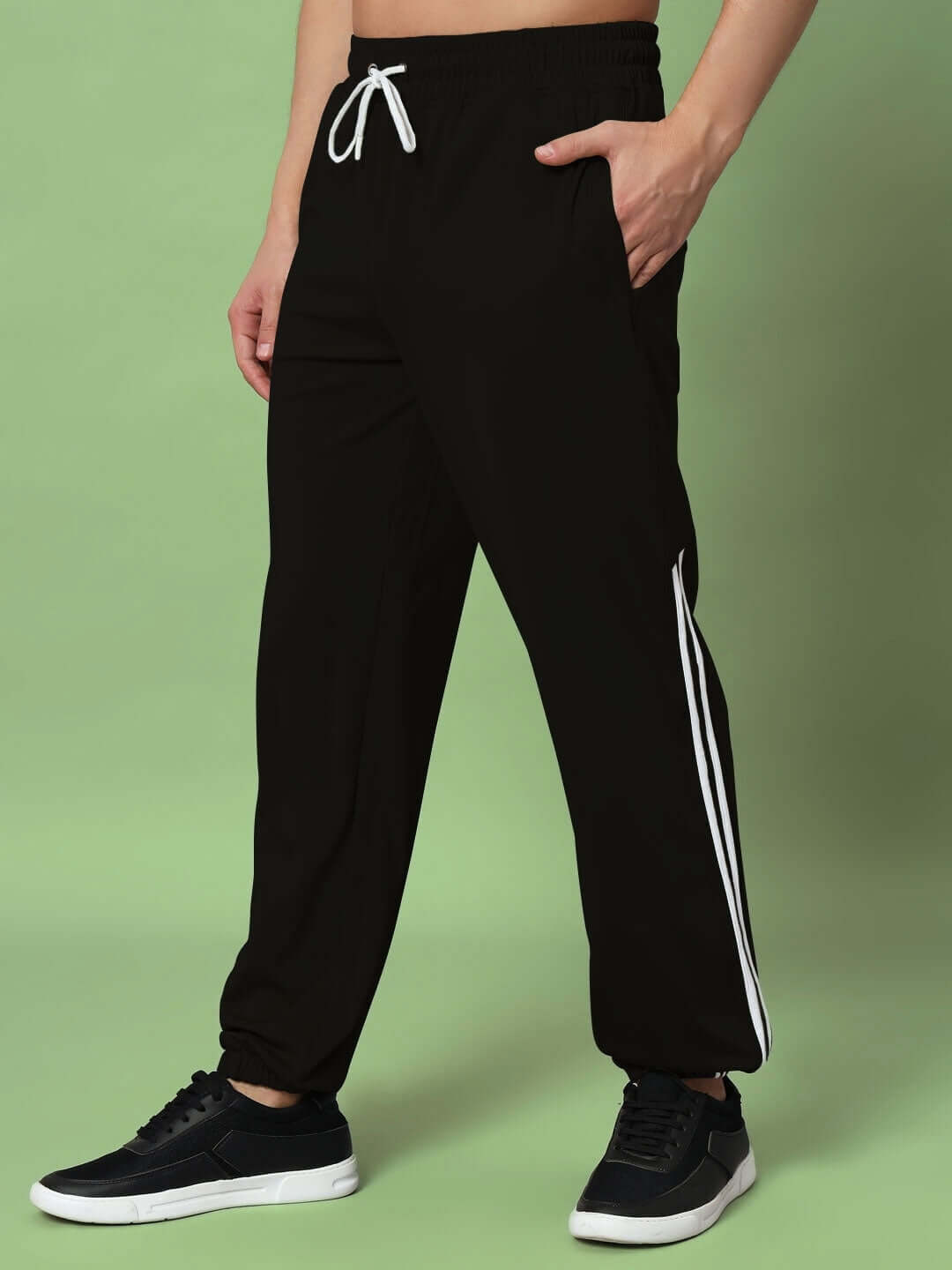 Men's black jogger pant, relaxed fit with white stripes and drawstring, made to order by DUDS. Customize with Custom Fit option.