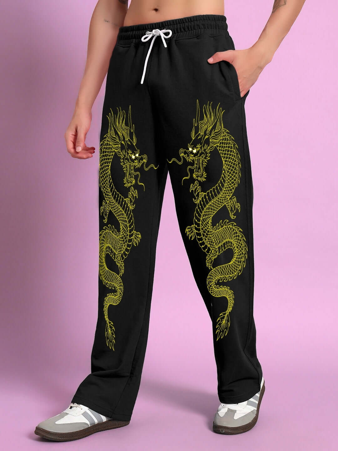 Black relaxed fit jogger with golden dragon print, featuring drawstring waist, styled for comfort and customization available.