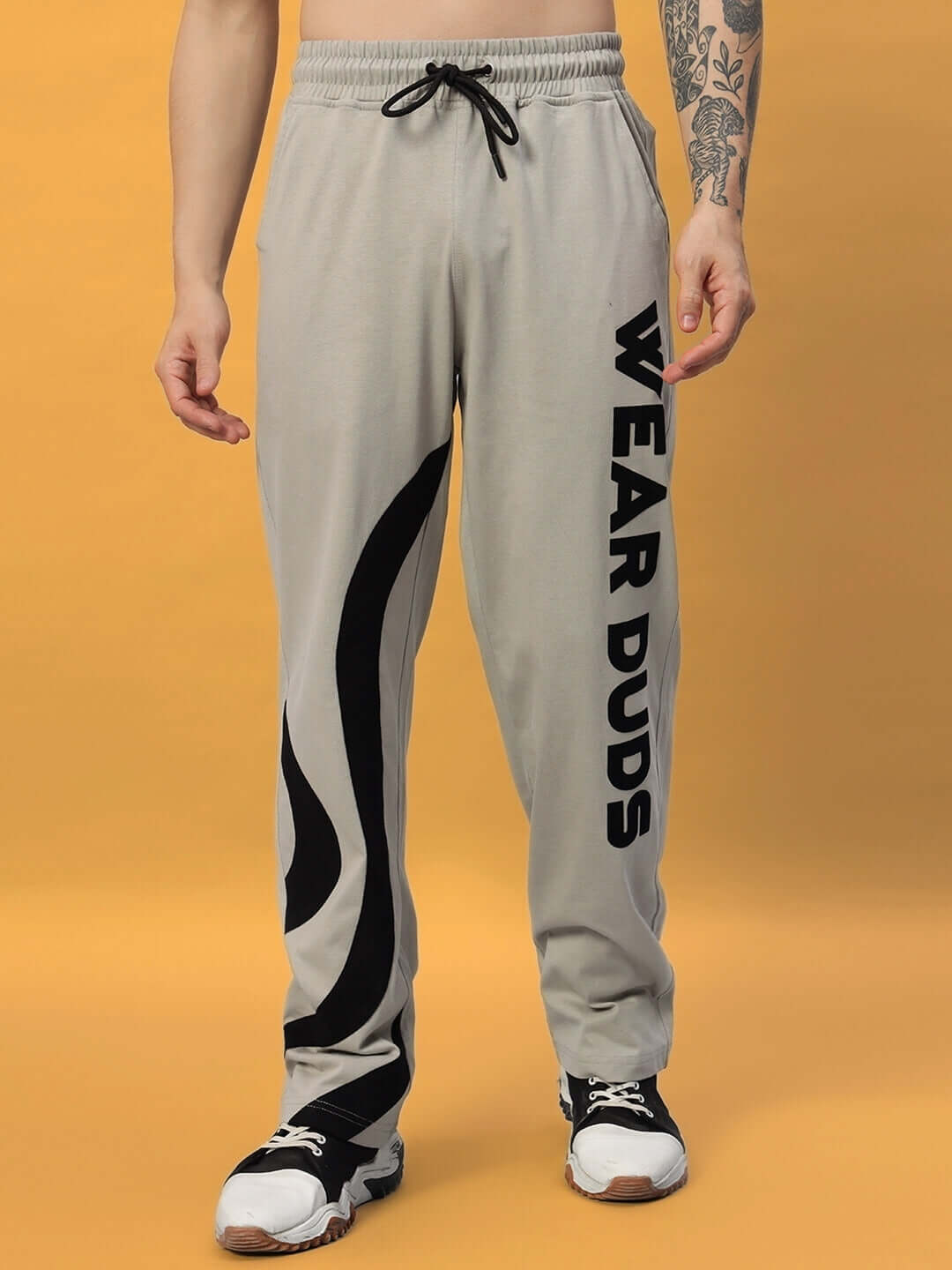 Grey SURFING JOGGER with black design and 'WEAR DUDS' printed, comfortable fit, made to order, customizable, perfect for active wear.