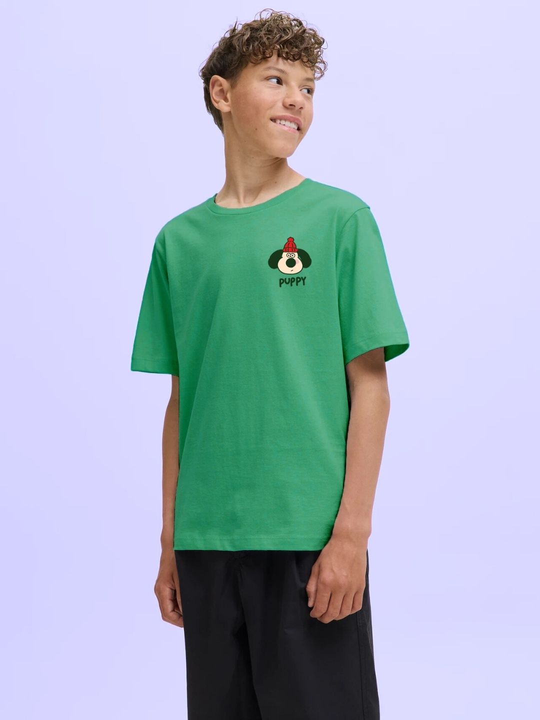 TADDY PUPPY T-SHIRT FOR BOYS AND GIRLS GREEN worn by a smiling boy in a casual pose