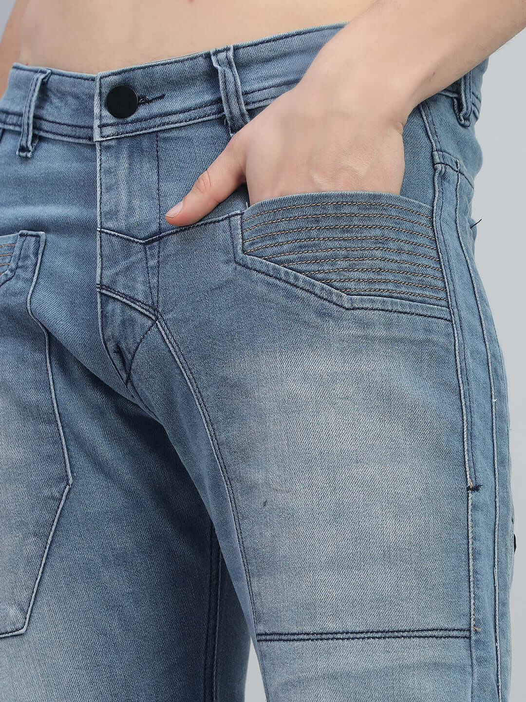 Close-up of Thrifty Regular Fit Denim Jeans in blue highlighting pocket stitching.