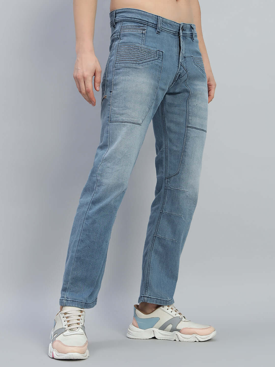 Model wearing Thrifty Regular Fit Denim Jeans in Blue, showcasing high-quality tailoring by DUDS, available for custom fit orders.