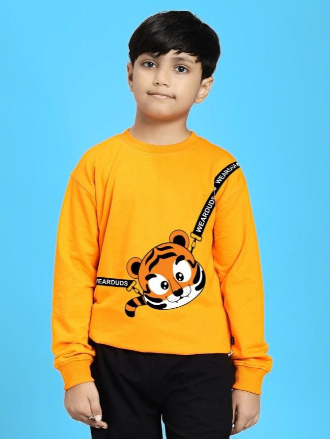 Boy wearing TIGON KIDS SWEATSHIRT FOR BOYS AND GIRLS ORANGE with tiger motif.