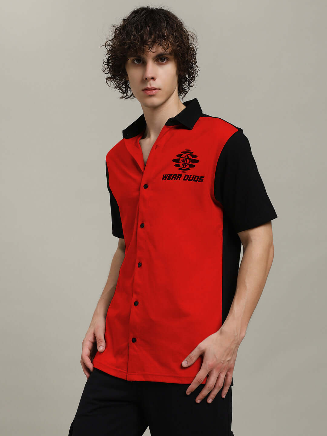 Model wearing Tinge regular fit red-black shirt by DUDS, customizable for prepaid orders, ideal for stylish casual wear.