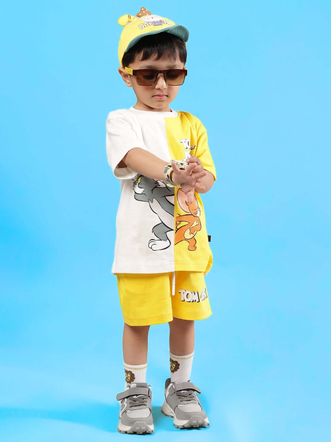 Child wearing a yellow Tom & Jerry co-ord set, featuring a playful cartoon design. Perfect for boys and girls, made with quality craftsmanship.