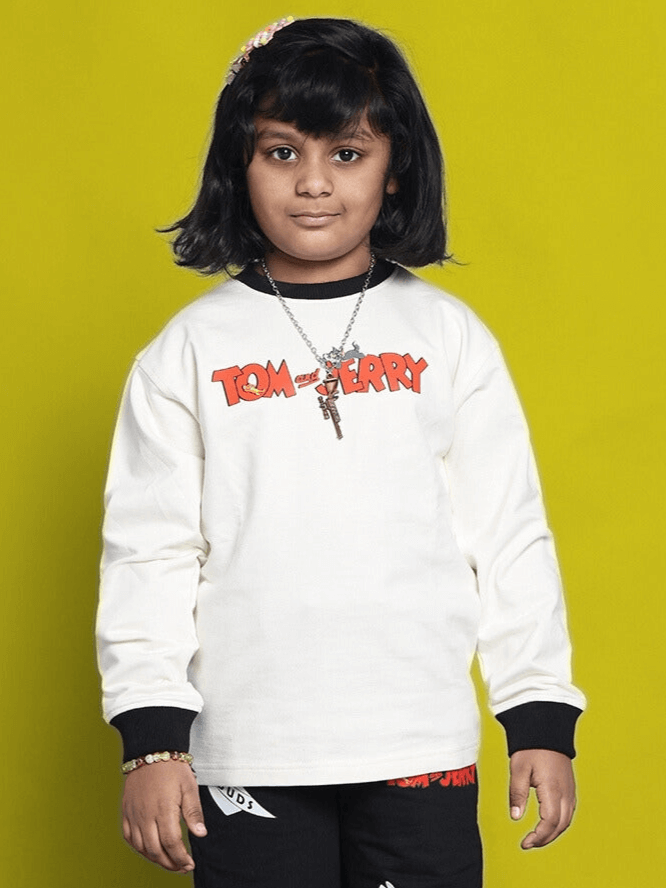 Child wearing Tom & Jerry oversized off white-black sweatshirt; 100% cotton, premium fabric; ideal for boys & girls, comfy and stylish.