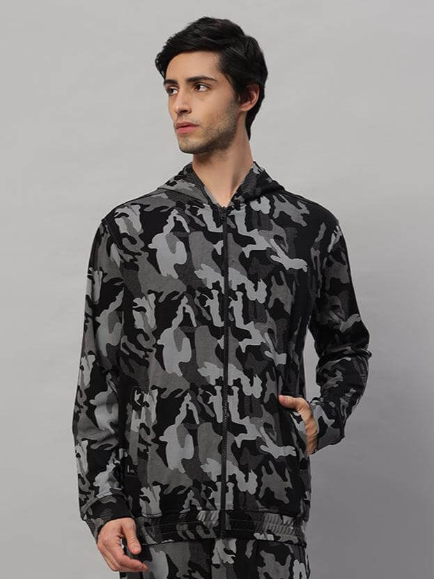 Man wearing a trendy camo navy trench jacket made to order by DUDS, featuring a unique camouflage pattern.