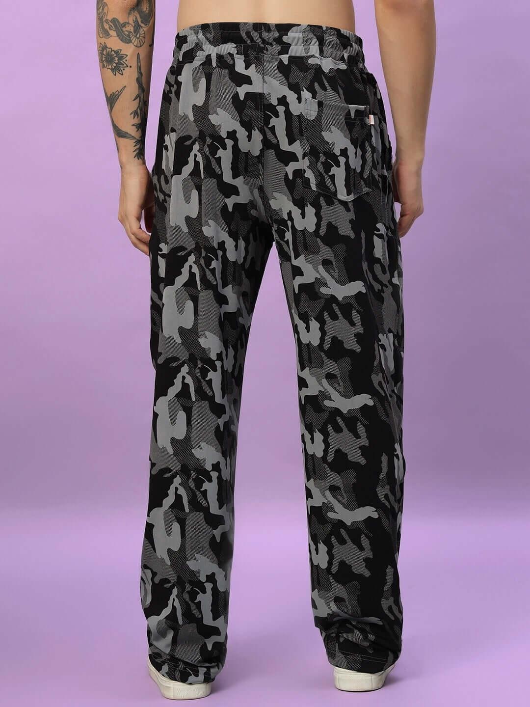 Back view of man wearing Trench Relaxed Pant Jogger in Camo Navy pattern, showcasing comfortable fit and design.