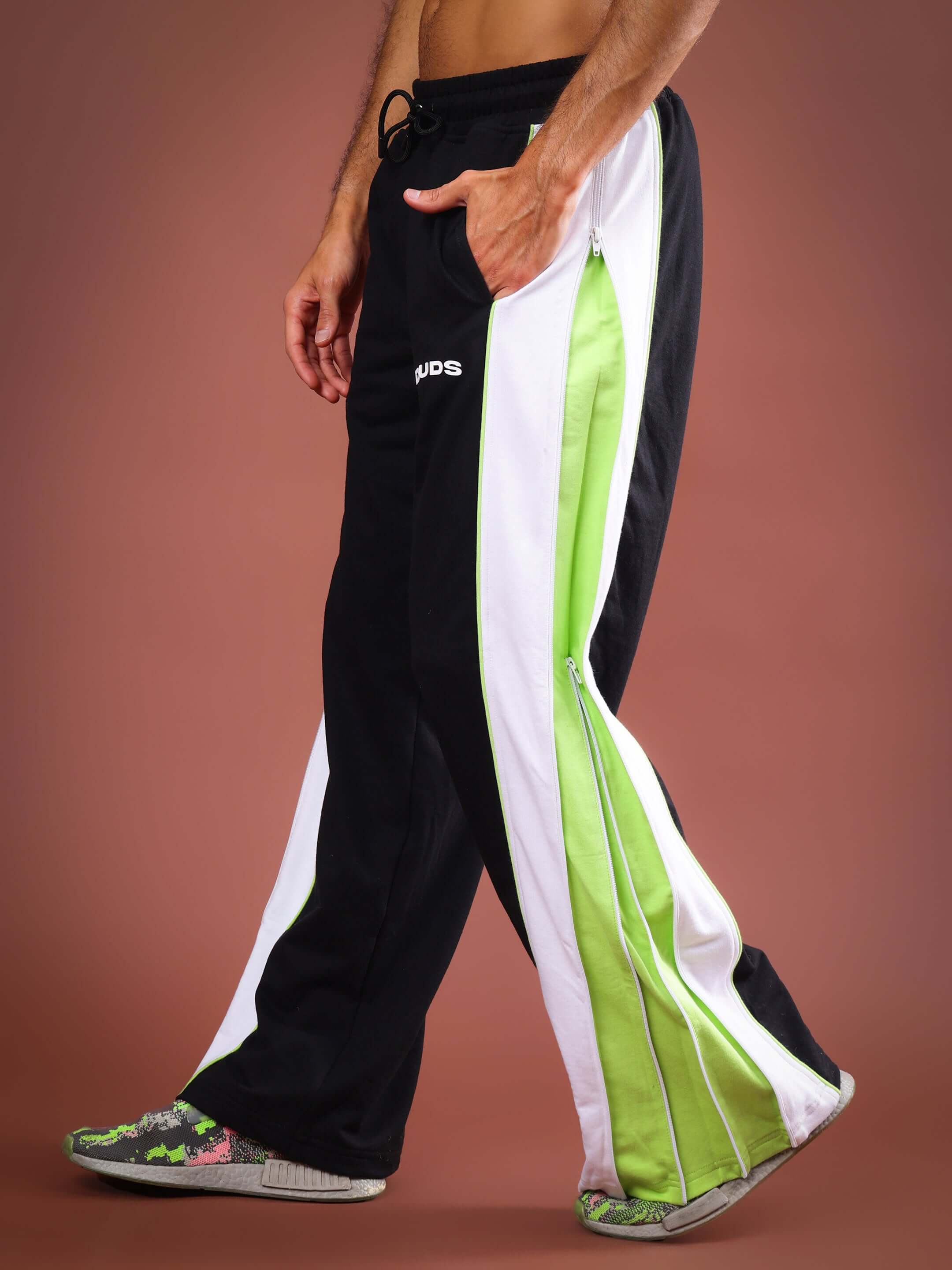 Alt Tag: TRIUMPH Multi Zipper Joggers in Black and Neon Green, stylish and customizable, made by expert tailors at DUDS.