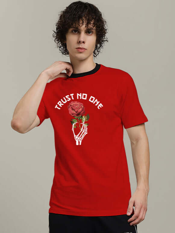 Man wearing red 'Trust No One' printed t-shirt featuring a skeleton hand holding a rose, made of premium 100% cotton fabric.