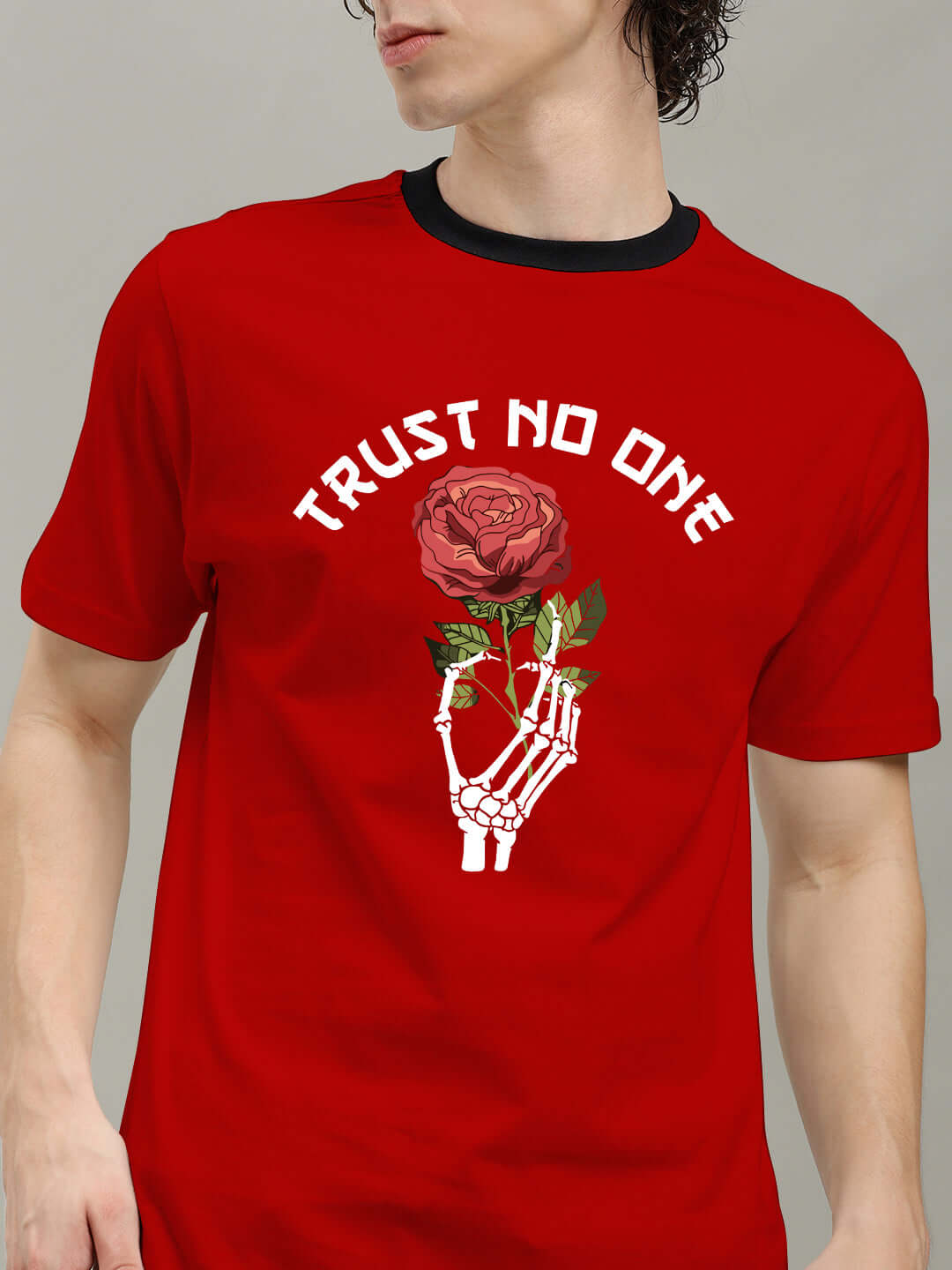 TRUST NO ONE REGULAR FIT PRINTED T-SHIRT RED with skeletal hand and rose graphic.