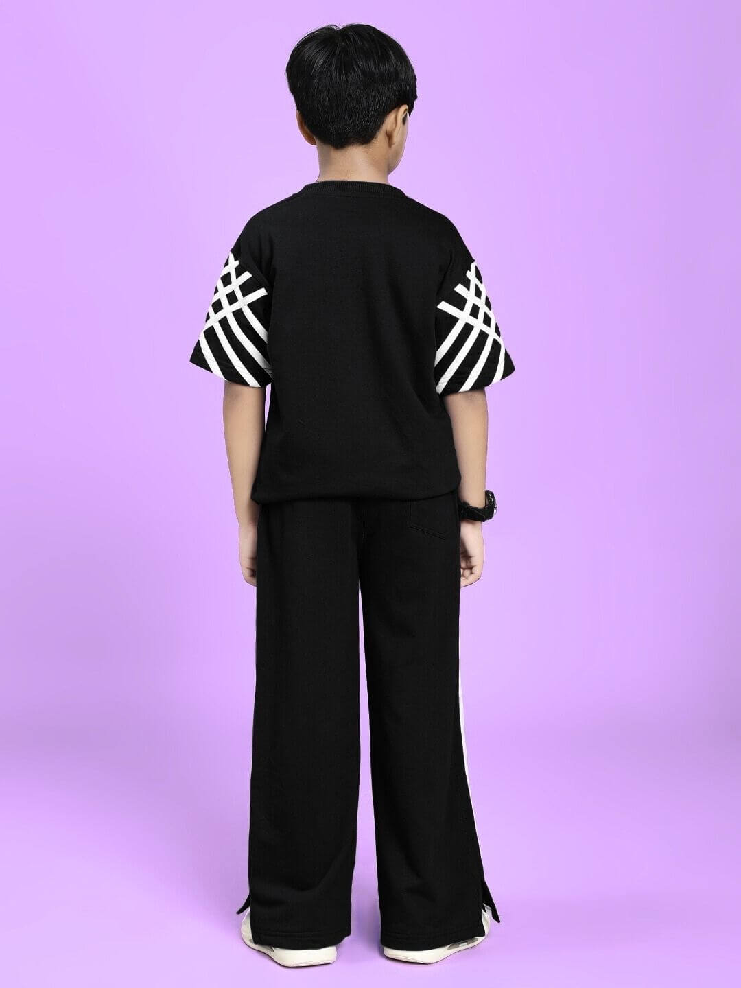 Back view of UNITED STRIPE CO-ORD SET FOR BOYS GIRLS BLACK, showcasing the stripe detailing and comfortable fit for active kids.