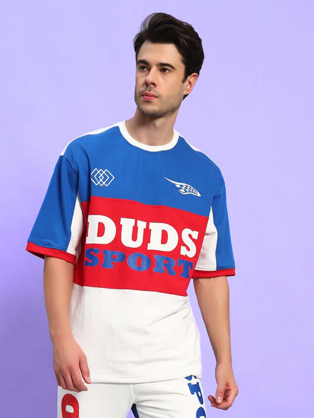 Man wearing URBAN DRIFT OVER-SIZED T-SHIRT MULTI in a streetwear style.