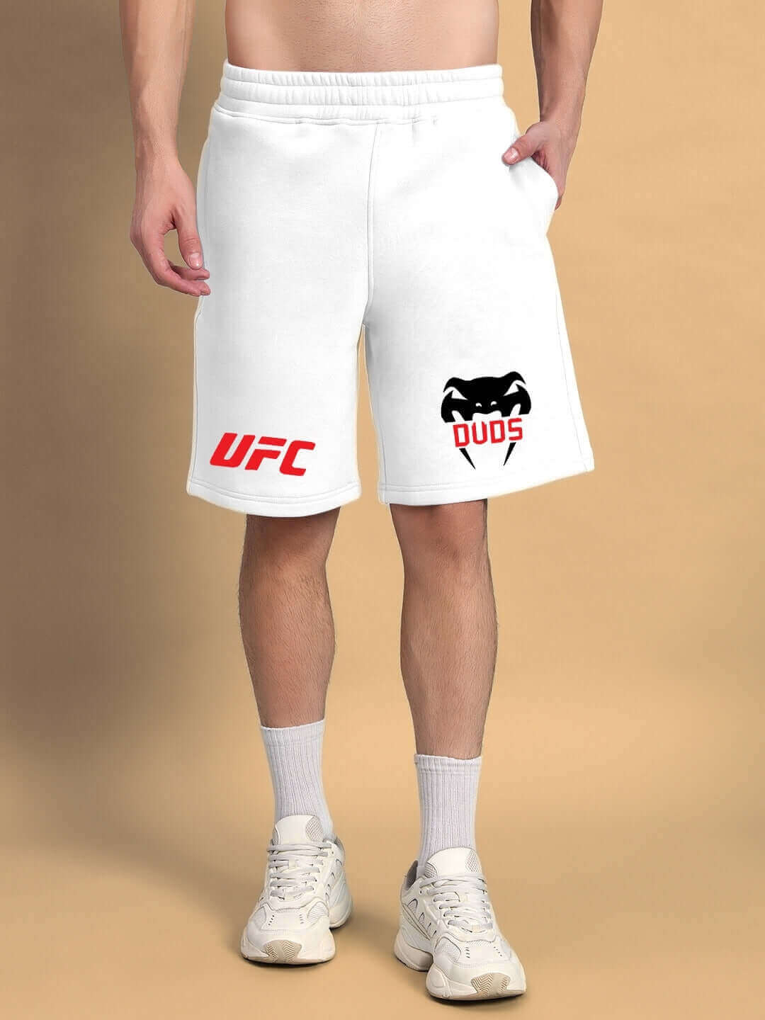 Model wearing WEARDUDS VENUM FLEECE CO-ORD WHITE shorts by DUDS, featuring UFC and DUDS logos, available for custom fit orders.