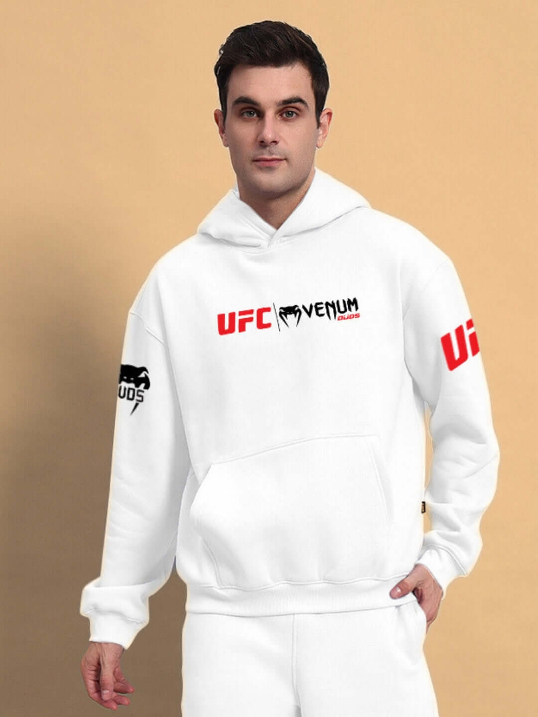 Man wearing WEARDUDS VENUM FLEECE HOODIE WHITE with UFC logo on chest and sleeves, made to order for a custom fit.