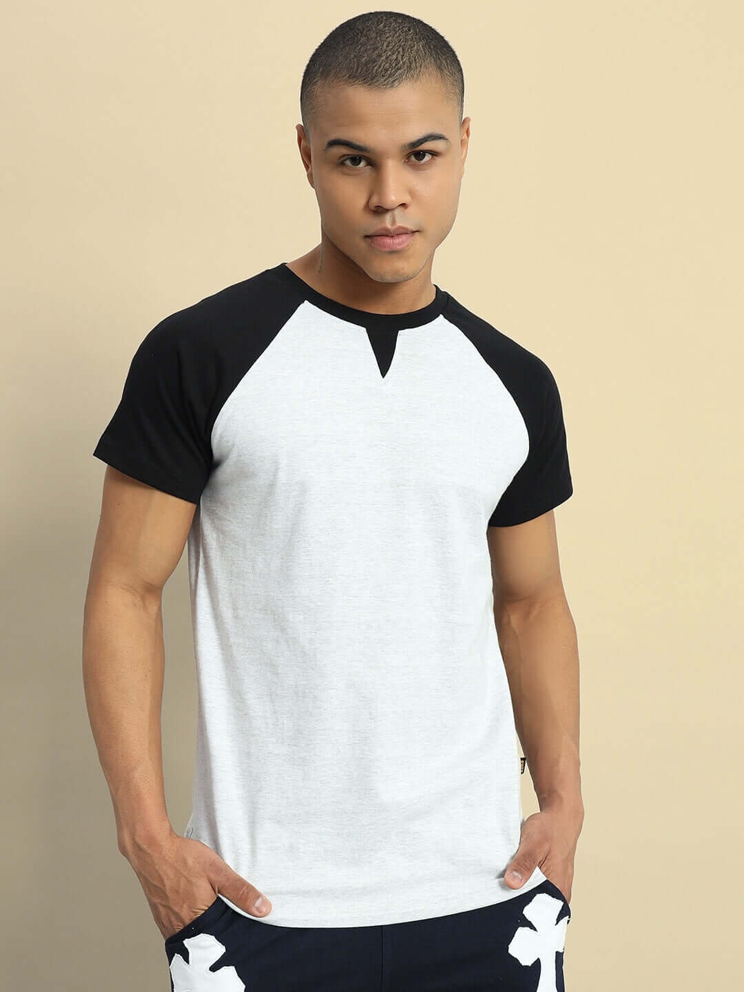 Model wearing Verpa regular fit grey melange t-shirt made from 100% cotton, showcasing premium fabric quality and comfortable fit.