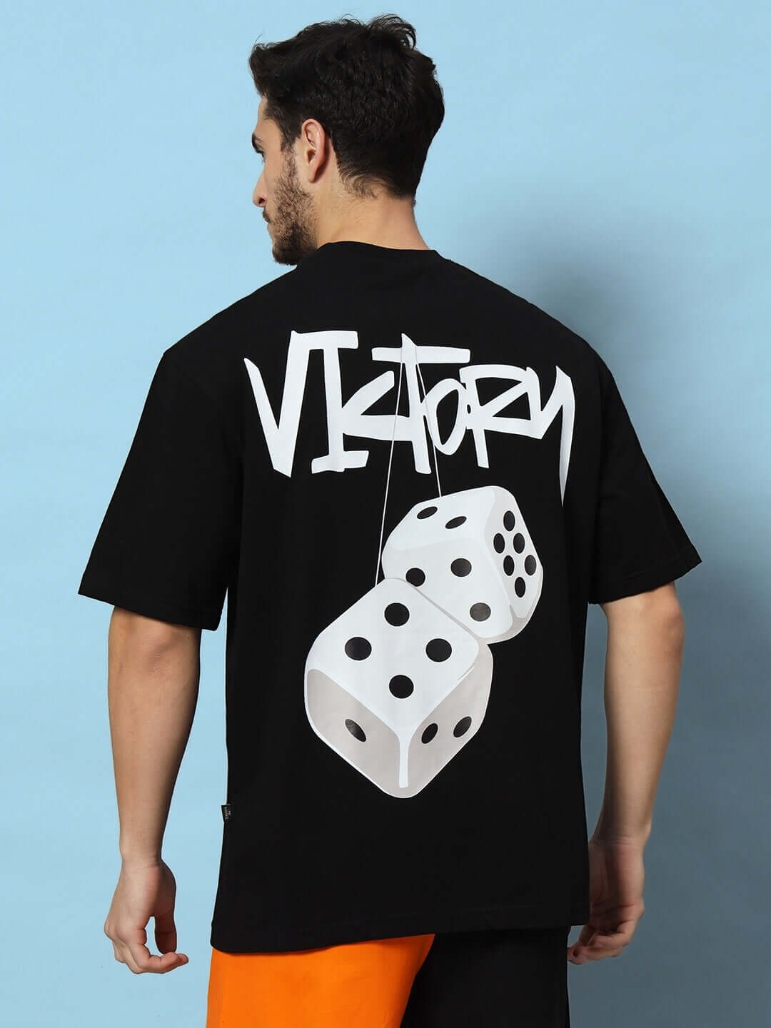 VICTORY over-sized black T-shirt with dice graphic and bold lettering on the back, customizable size options available.