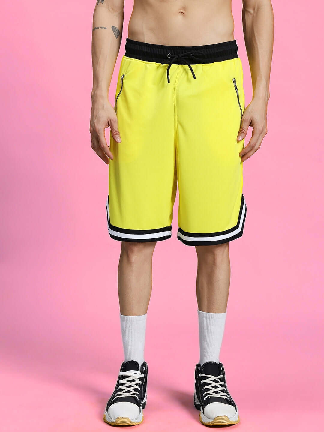 VIGOR REGULAR FIT SHORTS YELLOW with black trim, front view, worn by male model, perfect for customizable fit.