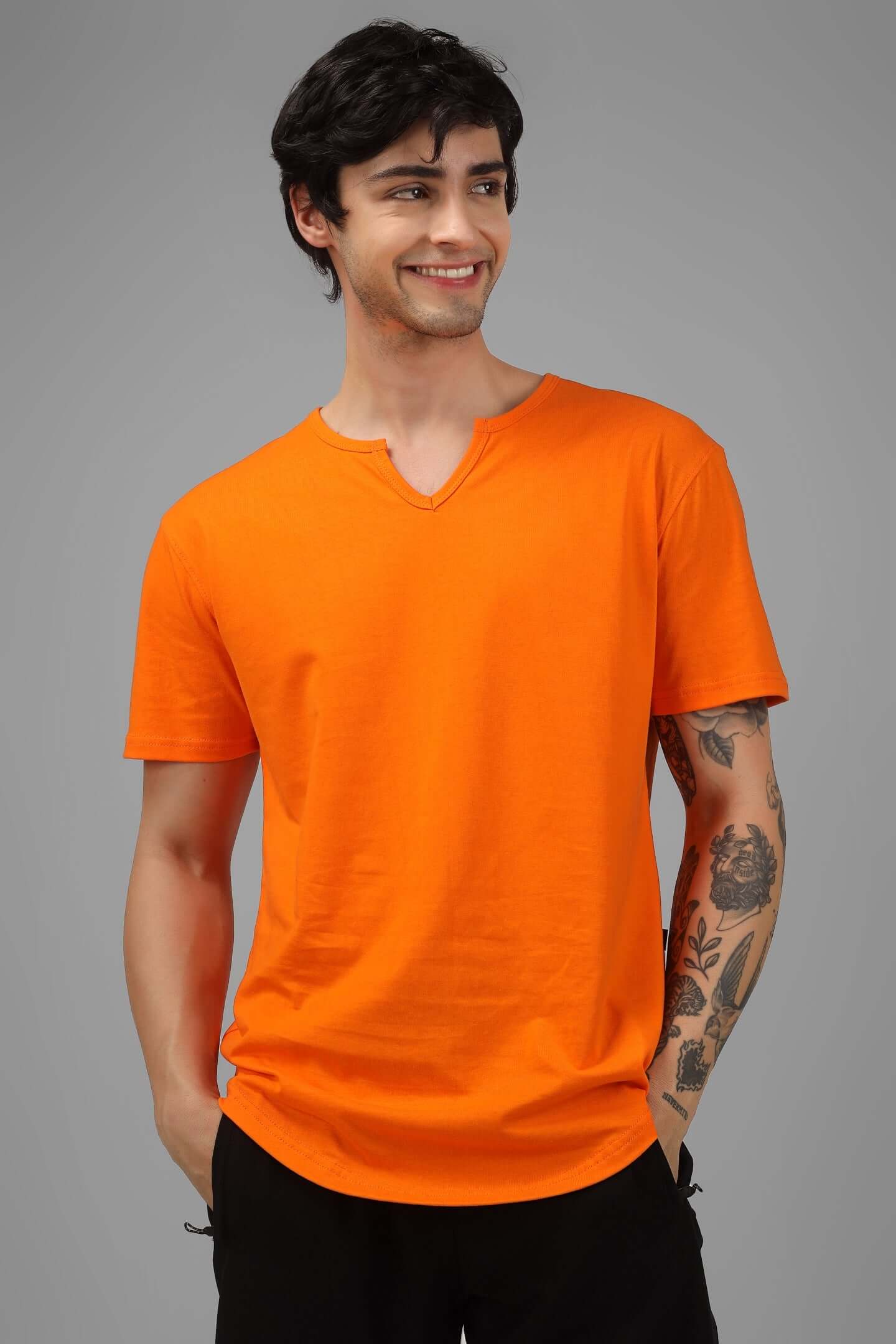 Viking regular fit orange T-shirt made of 100% cotton, modeled by a person, perfect for casual wear. High-quality fabric, bio-washed for softness.