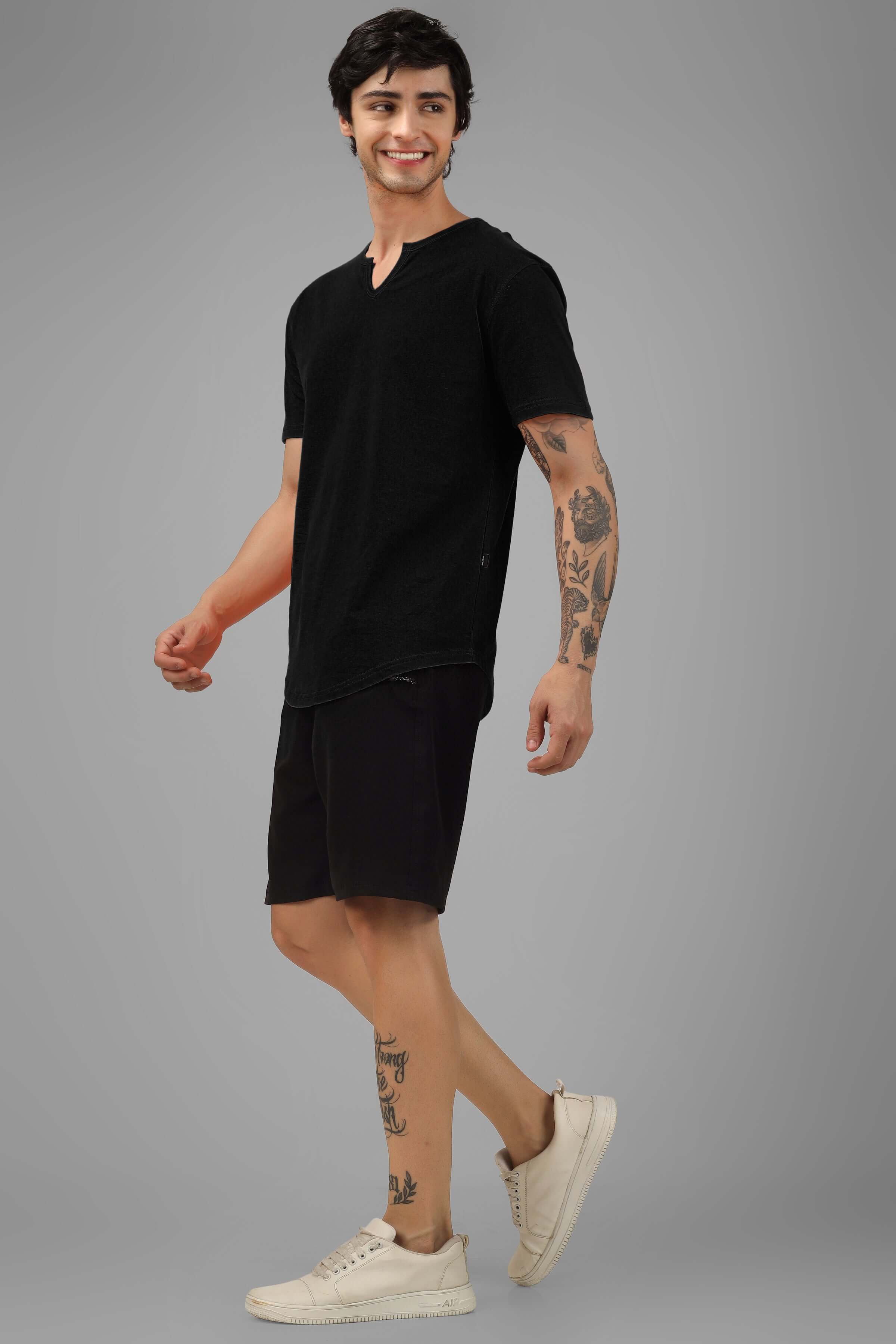 Model wearing VIKING REGULAR FIT T-SHIRT BLACK, showcasing timeless style and relaxed silhouette with premium cotton comfort.