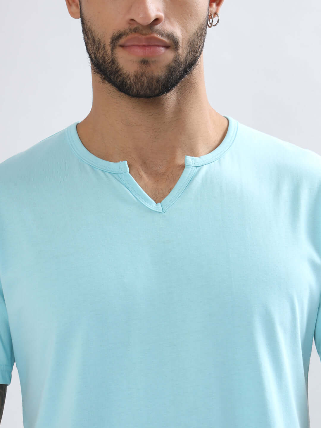 Model wearing Viking regular fit sky blue T-shirt made from 100% cotton, featuring premium heavy gauge fabric and a stylish neckline.