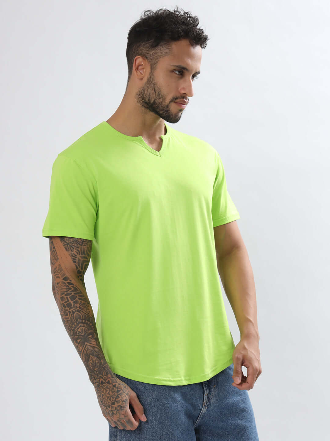 Model wearing neon green VIKING regular fit T-shirt in 100% cotton from Color By Colours.