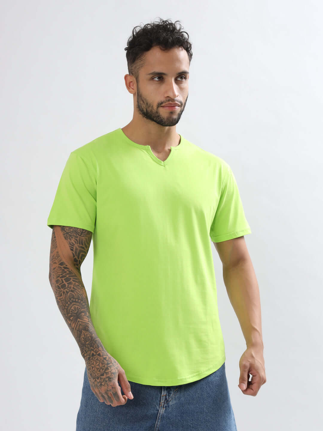 Man wearing neon green VIKING regular fit t-shirt by Color By Colours, showcasing premium 100% cotton fabric.