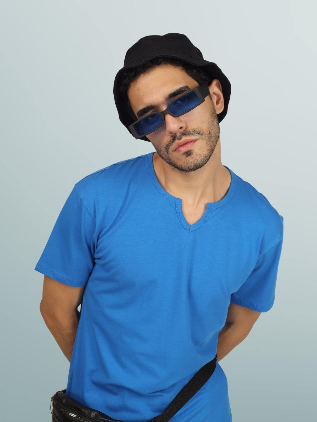 Man wearing Viking regular fit royal blue t-shirt with sunglasses and a black hat, showcasing casual fashion style.