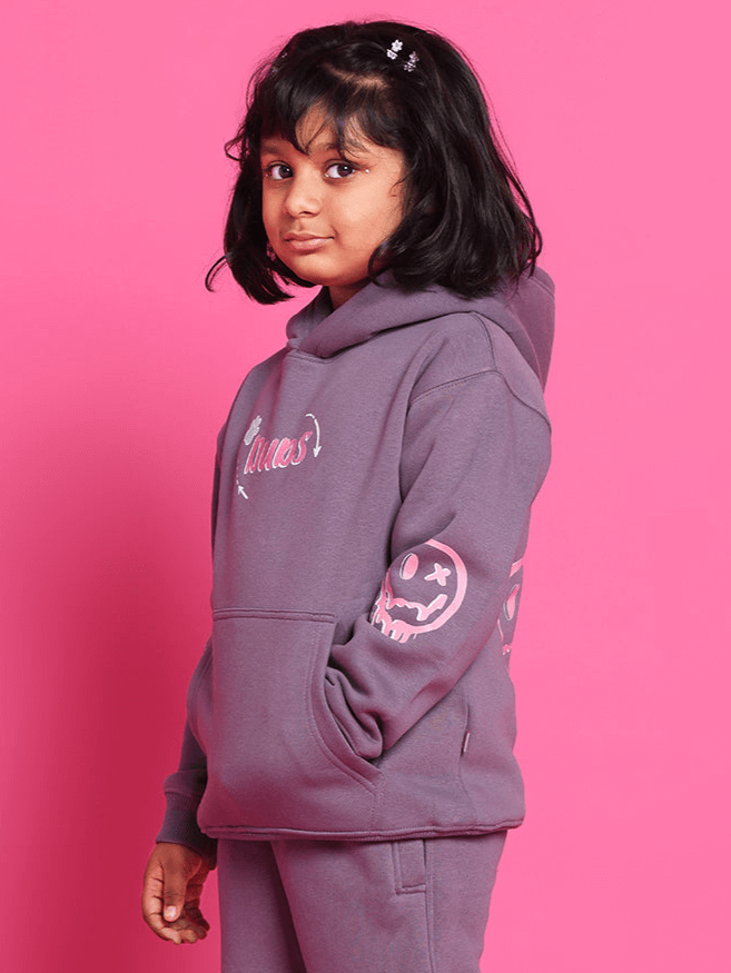 Child wearing CASPER OVERSIZED HOODIE BOYS & GIRLS VIOLET against pink background