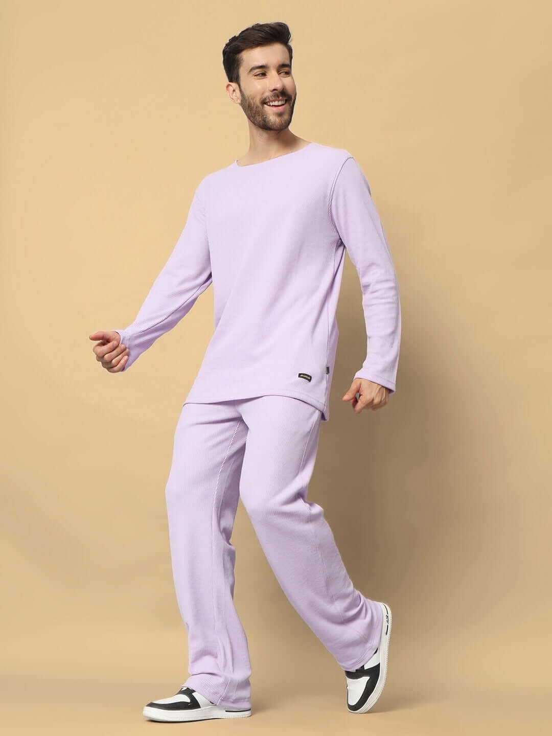 Unisex lilac oversized co-ord set with relaxed fit joggers, waffle texture, and drawstring waist, made from 100% cotton.